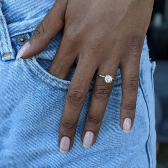 Mia ring - 1.1 carat round diamond ring on a finger