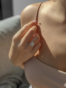 Brittany ring - 4.02 carat cushion lab-grown diamond ring on a finger