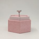Ellie ring in a pink box - from the side