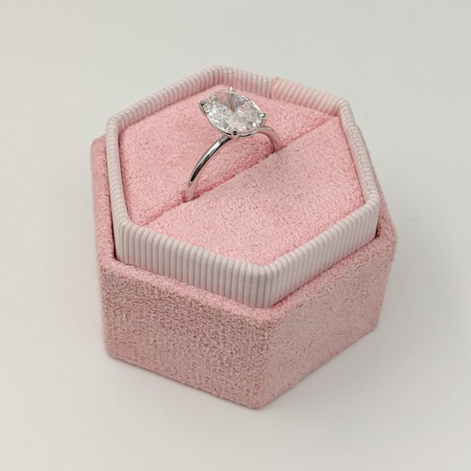 Amelia ring in a decorative box from the side