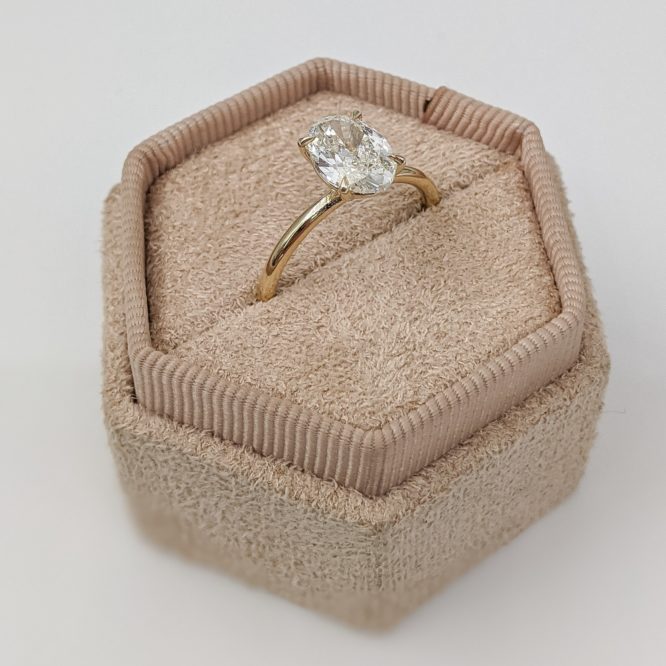 Amelia ring shown in a decorative box from the top