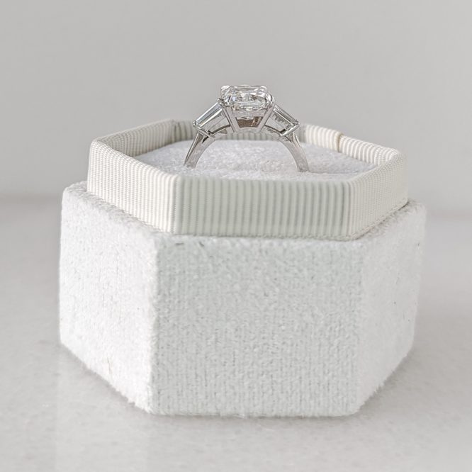 Riley ring in a decorative box from the side