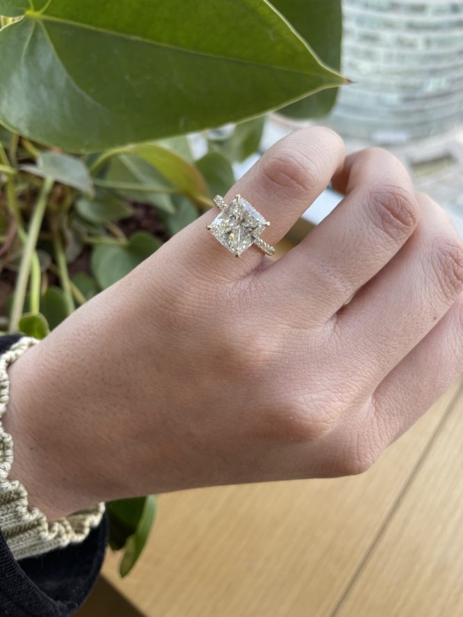 Cushion Diamond Engagement Ring, 14K Yellow Gold With Pave and Hidden Halo Ring on the finger