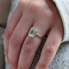 Everly engagement ring worn on a finger