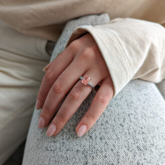 Stella ring worn on a finger