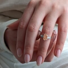 Stella ring worn on a finger